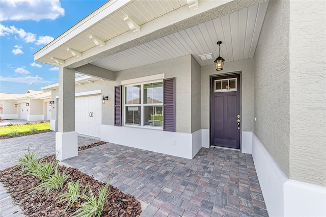 9865 SW 105th Ct, Ocala, FL 34481 - doorway to property featuring stucco siding and a porch