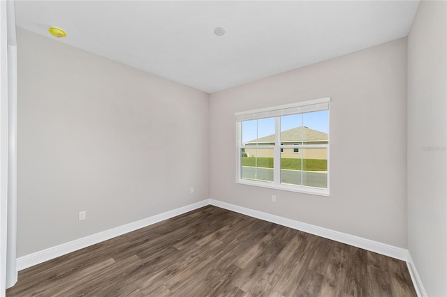 9865 SW 105th Ct, Ocala, FL 34481 - spare room with wood finished floors and baseboards