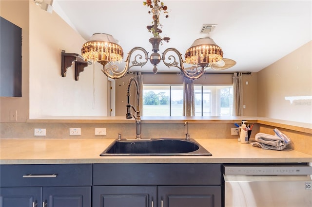 3019 NW Juanita Pl, Cape Coral, FL 33993 - kitchen with dishwasher, a sink, a chandelier, and light countertops