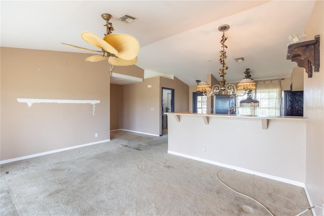3019 NW Juanita Pl, Cape Coral, FL 33993 - unfurnished living room featuring carpet, baseboards, a chandelier, and lofted ceiling