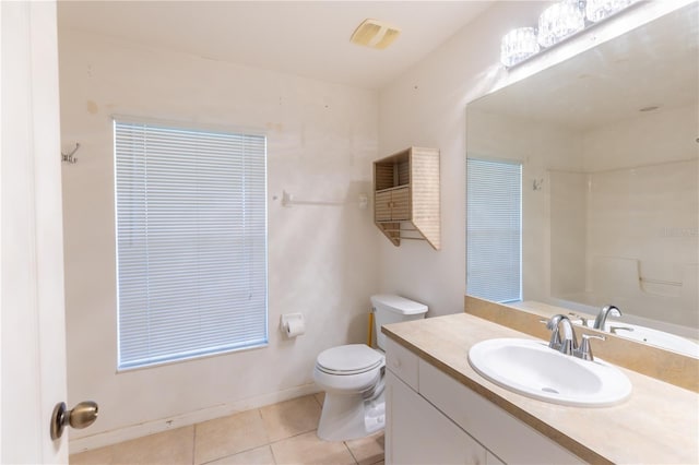 3019 NW Juanita Pl, Cape Coral, FL 33993 - bathroom featuring toilet, vanity, tile patterned flooring, a shower, and baseboards