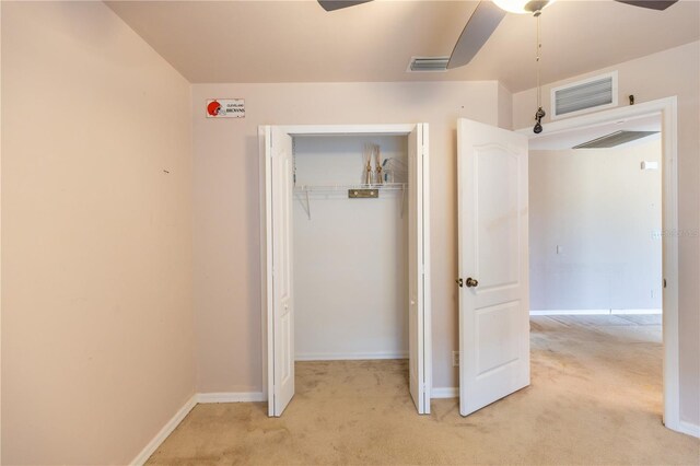 3019 NW Juanita Pl, Cape Coral, FL 33993 - unfurnished bedroom featuring light colored carpet, a closet, baseboards, and ceiling fan