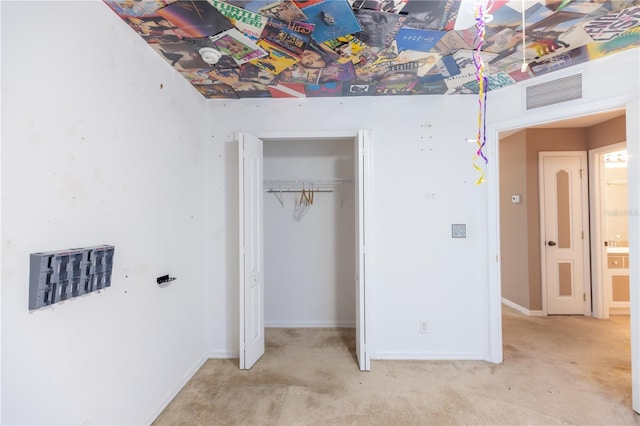 3019 NW Juanita Pl, Cape Coral, FL 33993 - unfurnished bedroom featuring carpet floors, a closet, and baseboards
