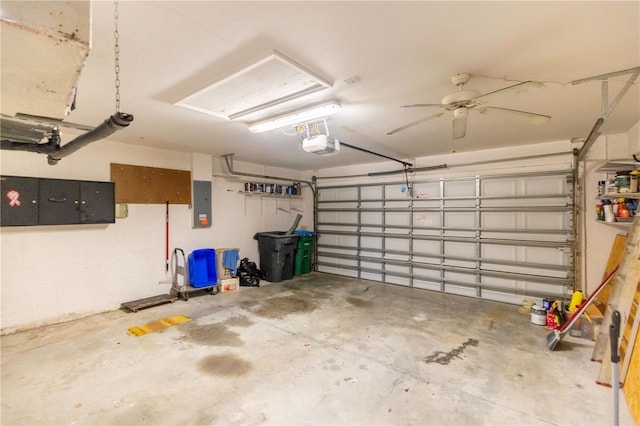 3019 NW Juanita Pl, Cape Coral, FL 33993 - garage featuring electric panel and a garage door opener