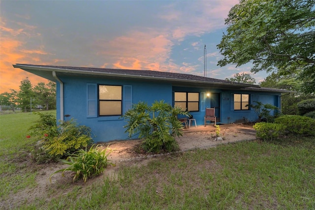 17128 SE 140th Ave, Weirsdale, FL 32195 - ranch-style home featuring stucco siding and a front yard