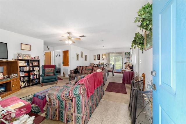 17128 SE 140th Ave, Weirsdale, FL 32195 - living room featuring light carpet and ceiling fan
