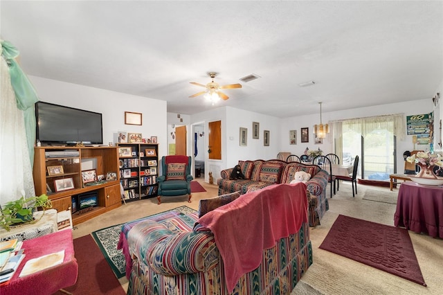 17128 SE 140th Ave, Weirsdale, FL 32195 - living area with carpet floors and ceiling fan