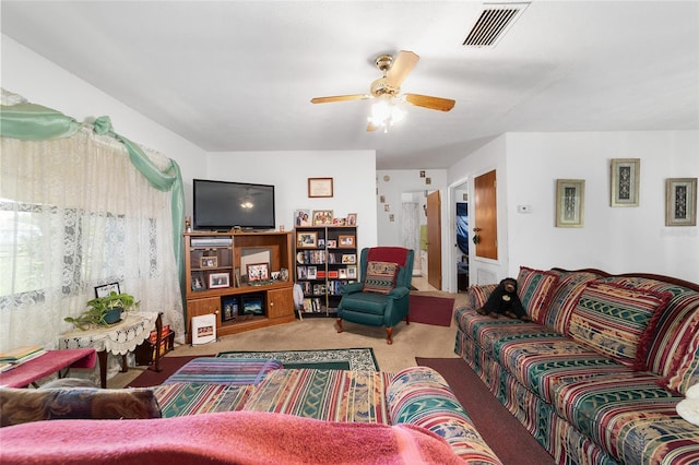 17128 SE 140th Ave, Weirsdale, FL 32195 - living room featuring carpet and a ceiling fan