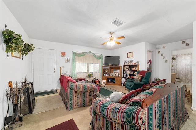 17128 SE 140th Ave, Weirsdale, FL 32195 - living area with carpet floors and a ceiling fan