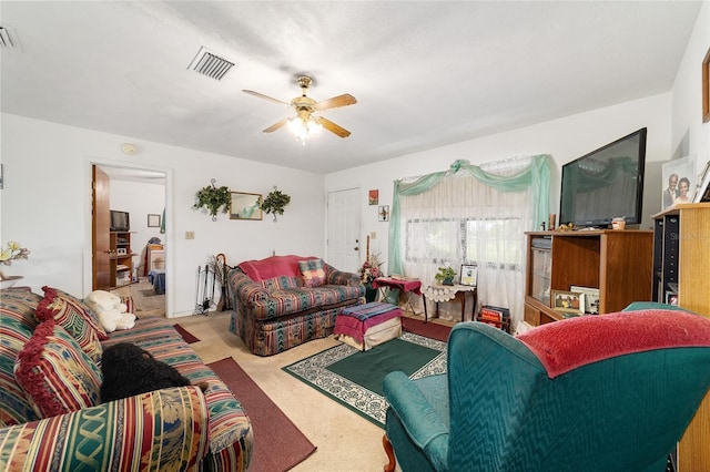 17128 SE 140th Ave, Weirsdale, FL 32195 - living area featuring a ceiling fan and carpet floors