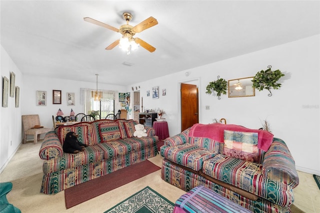 17128 SE 140th Ave, Weirsdale, FL 32195 - carpeted living room with ceiling fan, a chandelier, and baseboards