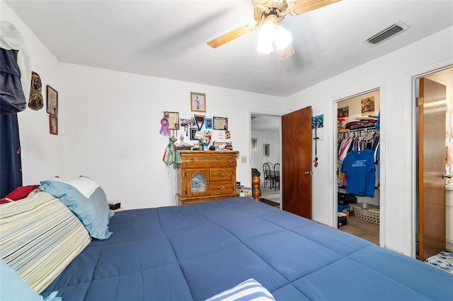 17128 SE 140th Ave, Weirsdale, FL 32195 - bedroom with a ceiling fan, a closet, and a spacious closet
