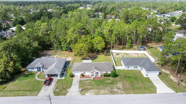 9 Bahia Trace Loop, Ocala, FL 34472 - aerial perspective of suburban area featuring a heavily wooded area