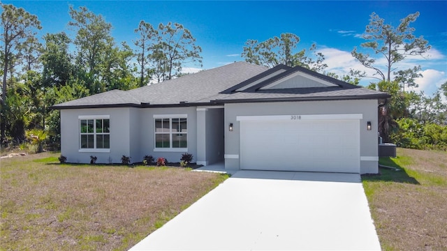 3018 Oceanside St, North Port, FL 34286 - ranch-style house featuring a garage, driveway, a front yard, stucco siding, and a shingled roof