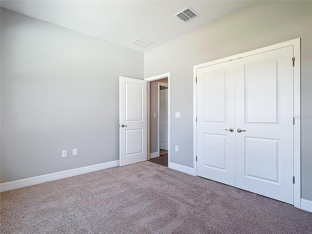 3018 Oceanside St, North Port, FL 34286 - unfurnished bedroom featuring carpet flooring, baseboards, and a closet