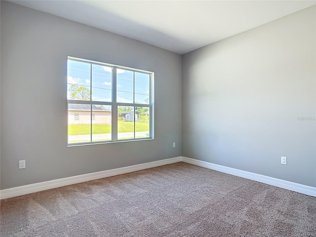 3018 Oceanside St, North Port, FL 34286 - carpeted empty room with baseboards