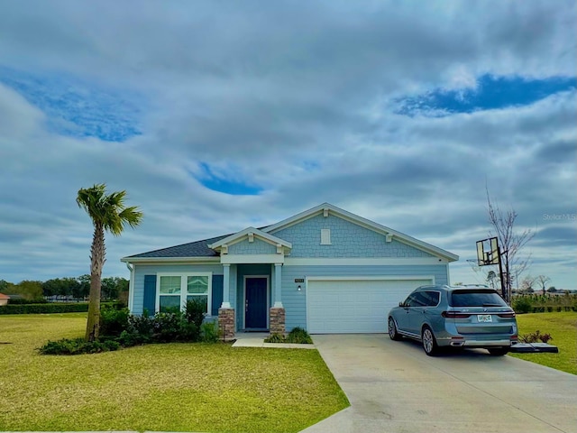 9253 SW 58th Cir, Ocala, FL 34476 - craftsman-style home with an attached garage, concrete driveway, a front lawn, and stone siding