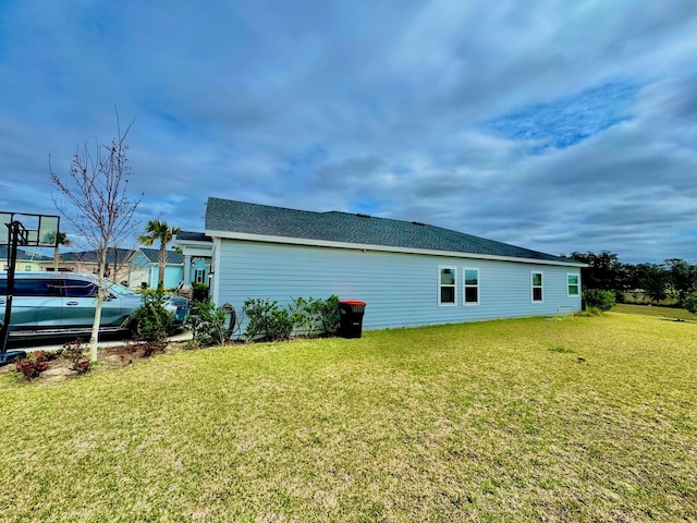 9253 SW 58th Cir, Ocala, FL 34476 - view of side of home with a lawn