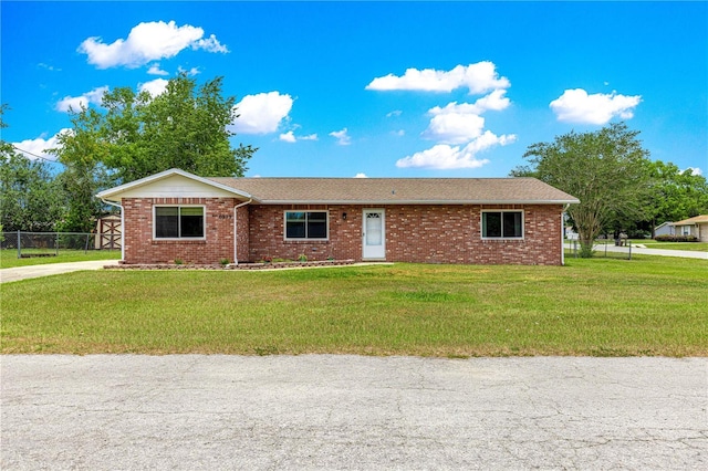 6989 SE 52nd Pl, Ocala, FL 34472 - ranch-style house featuring brick siding