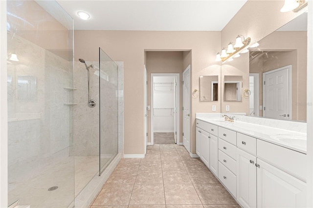 8961 SE 130th Loop, Summerfield, FL 34491 - full bath with double vanity, walk in shower, tile patterned flooring, and a walk in closet