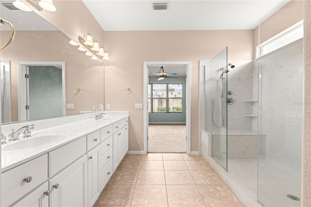 8961 SE 130th Loop, Summerfield, FL 34491 - bathroom with plenty of natural light, double vanity, walk in shower, and tile patterned floors