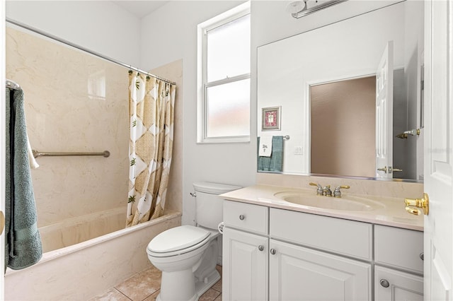 8961 SE 130th Loop, Summerfield, FL 34491 - bathroom featuring toilet, vanity, shower / tub combo, and tile patterned floors
