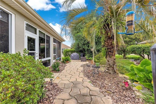 8961 SE 130th Loop, Summerfield, FL 34491 - view of patio / terrace with a sunroom
