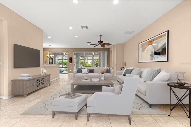 8961 SE 130th Loop, Summerfield, FL 34491 - tiled living room featuring ceiling fan, recessed lighting, a chandelier, and baseboards