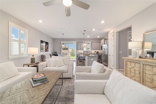 5651 NW 40th Pl, Ocala, FL 34482 - living area featuring ceiling fan, recessed lighting, and baseboards