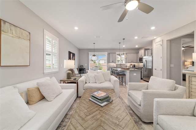5651 NW 40th Pl, Ocala, FL 34482 - living room with ceiling fan and recessed lighting