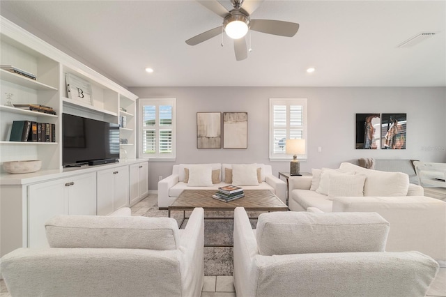 5651 NW 40th Pl, Ocala, FL 34482 - living area featuring healthy amount of natural light, ceiling fan, recessed lighting, and baseboards