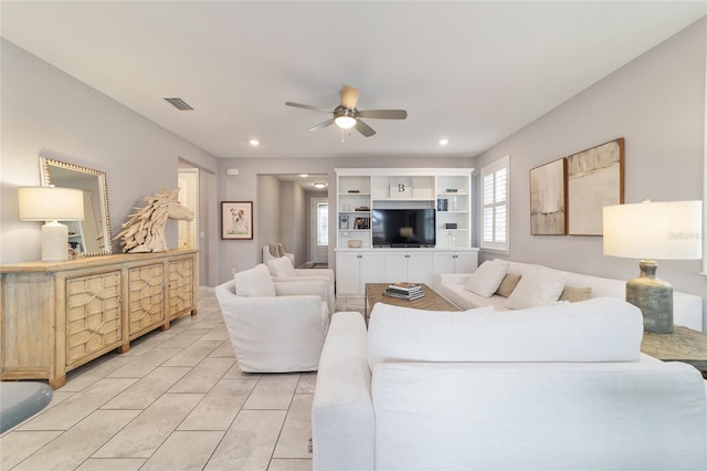 5651 NW 40th Pl, Ocala, FL 34482 - living area with ceiling fan, recessed lighting, and light tile patterned floors
