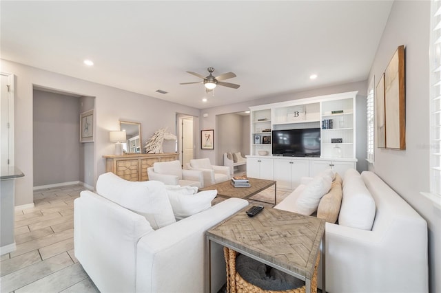 5651 NW 40th Pl, Ocala, FL 34482 - living room featuring ceiling fan, recessed lighting, baseboards, and light wood finished floors