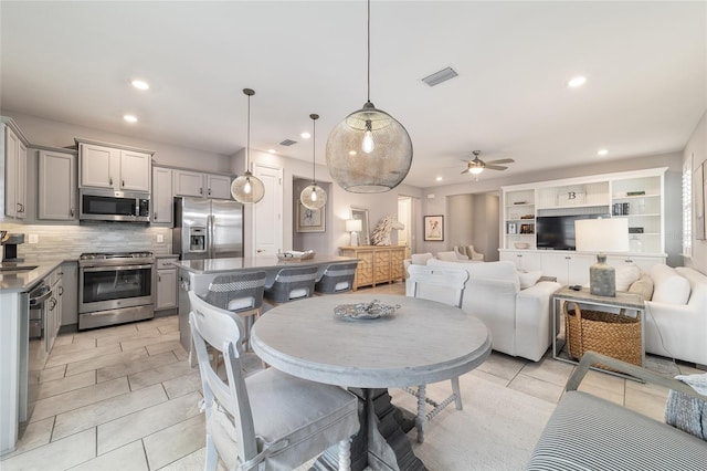 5651 NW 40th Pl, Ocala, FL 34482 - dining space featuring recessed lighting, a ceiling fan, and light tile patterned floors
