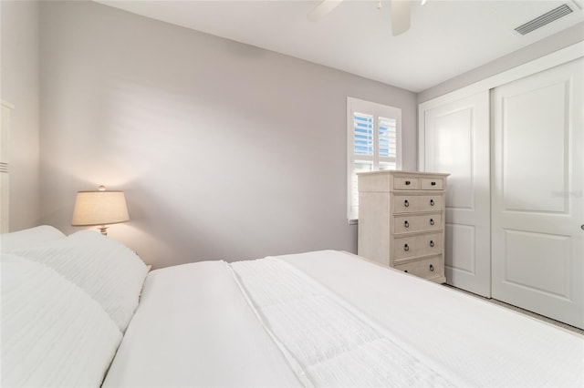 5651 NW 40th Pl, Ocala, FL 34482 - bedroom with a closet and ceiling fan