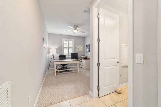 5651 NW 40th Pl, Ocala, FL 34482 - home office featuring a ceiling fan, baseboards, light carpet, and light tile patterned floors