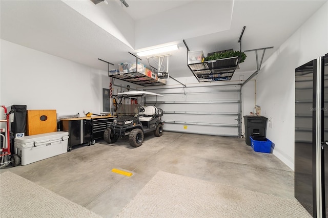 5651 NW 40th Pl, Ocala, FL 34482 - garage featuring a garage door opener