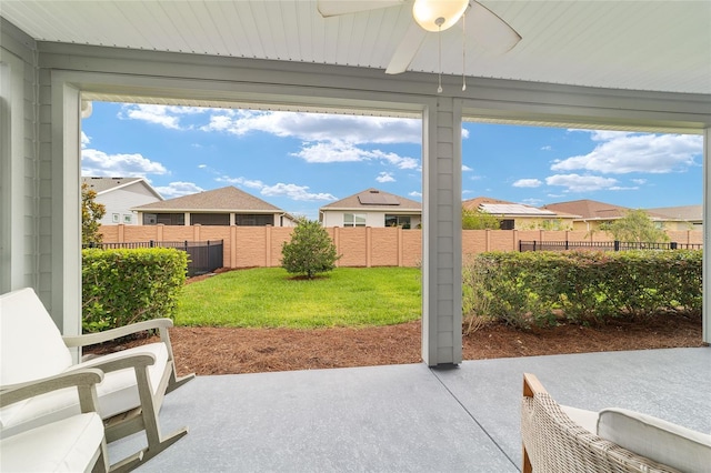 5651 NW 40th Pl, Ocala, FL 34482 - view of patio / terrace with a ceiling fan and a residential view