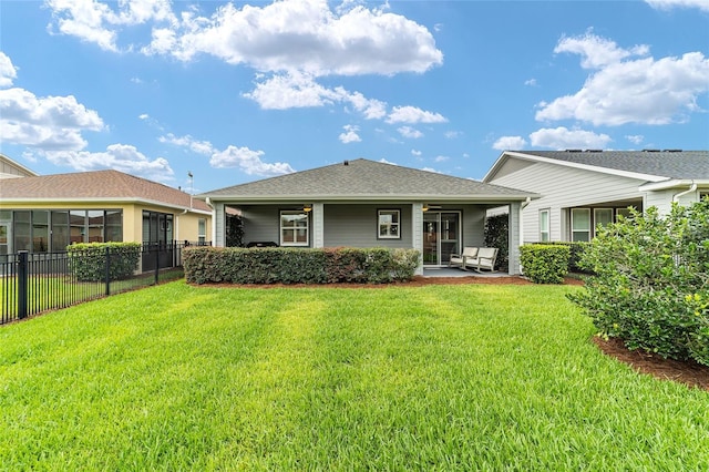 5651 NW 40th Pl, Ocala, FL 34482 - back of house featuring a ceiling fan and a shingled roof