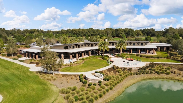 5651 NW 40th Pl, Ocala, FL 34482 - back of property with a patio, a water view, and a wooded view