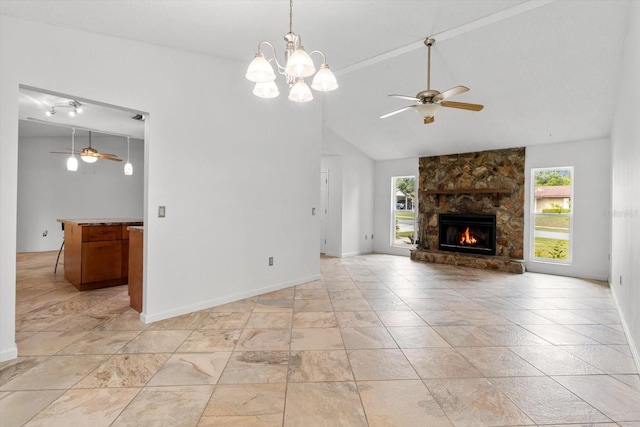 9606 N Caressa Way, Citrus Springs, FL 34434 - unfurnished living room with a ceiling fan, a stone fireplace, baseboards, a chandelier, and high vaulted ceiling