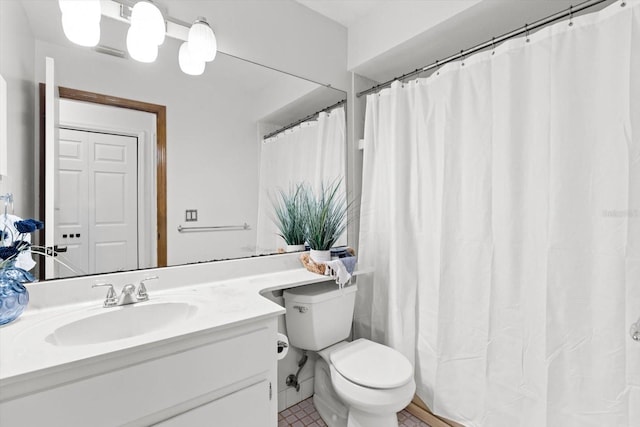 9606 N Caressa Way, Citrus Springs, FL 34434 - full bathroom with vanity, toilet, and tile patterned floors