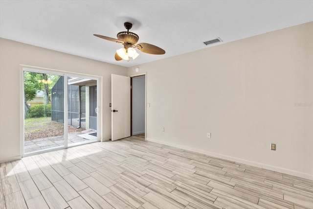 9606 N Caressa Way, Citrus Springs, FL 34434 - empty room featuring a ceiling fan, baseboards, and light wood-style flooring