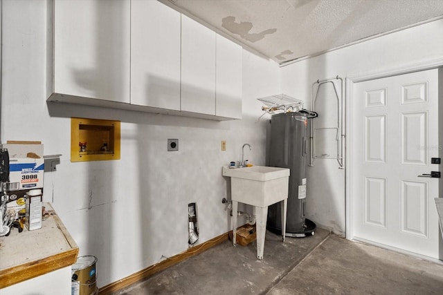 9606 N Caressa Way, Citrus Springs, FL 34434 - washroom with cabinet space, washer hookup, water heater, and hookup for an electric dryer