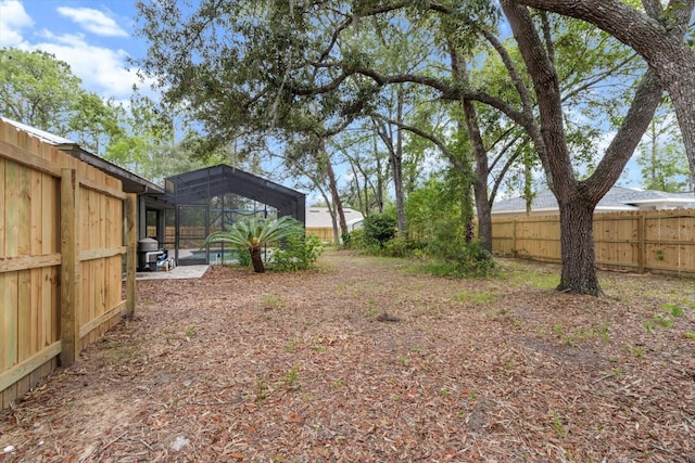 9606 N Caressa Way, Citrus Springs, FL 34434 - view of yard with glass enclosure and a pool