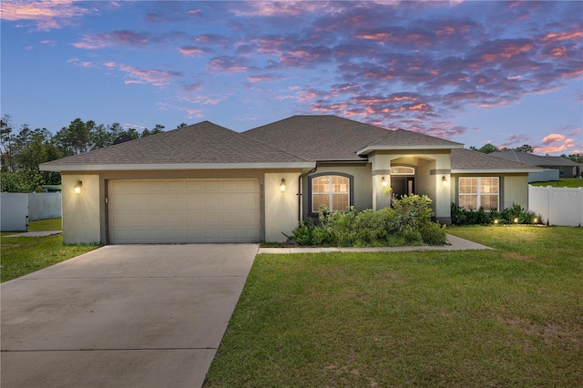 10910 SW 41st Ave, Ocala, FL 34476 - view of front of property with stucco siding, concrete driveway, an attached garage, and a shingled roof