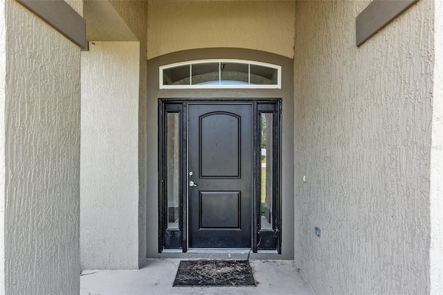 10910 SW 41st Ave, Ocala, FL 34476 - doorway to property with stucco siding