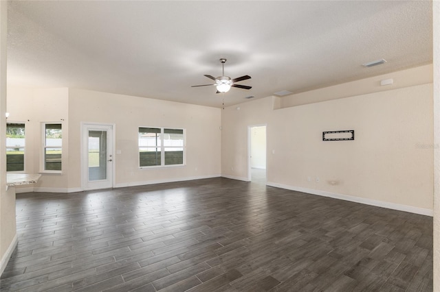10910 SW 41st Ave, Ocala, FL 34476 - unfurnished room with a ceiling fan, dark wood-style floors, and baseboards