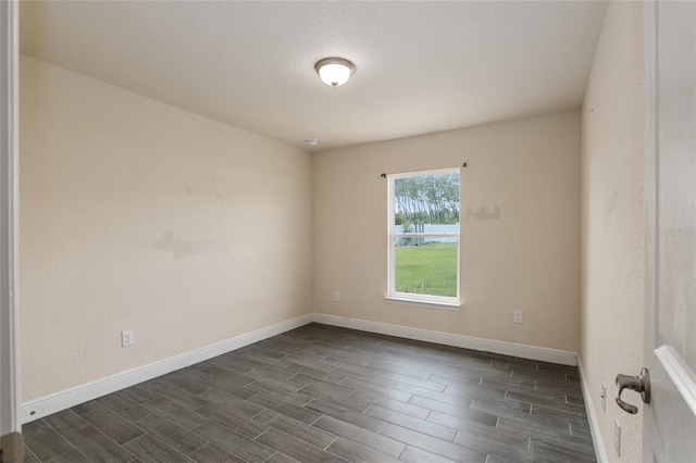 10910 SW 41st Ave, Ocala, FL 34476 - empty room featuring wood tiled floors and baseboards
