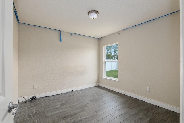 10910 SW 41st Ave, Ocala, FL 34476 - unfurnished room with wood finished floors and baseboards